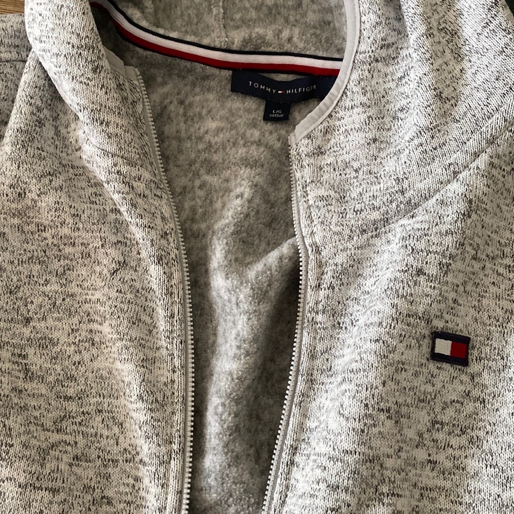 Lg gray Tommy jacket with hood and pockets good condition